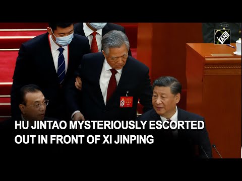 Former Chinese leader Hu Jintao mysteriously escorted out in front of Xi Jinping