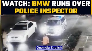 Hyderabad: Police inspector hit by BMW on Tank Bund Road | Watch CCTV footage | Oneindia News