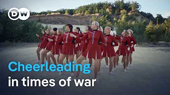Team spirit in the face of terror - Ukrainian cheerleaders dance on | DW Documentary