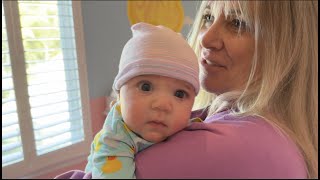 Putting on her Newborn Hat again! (2 months postpartum) *cute*