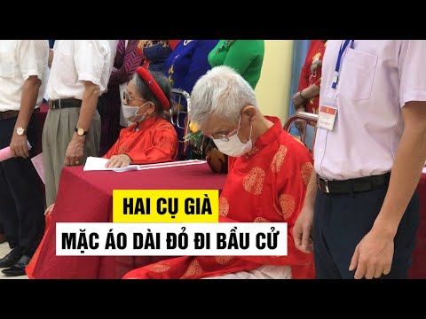 Video Hai cụ già gần 100 tuổi mặc áo dài đỏ, cùng thủ lĩnh... - youtube