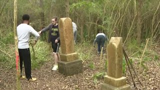 Volunteers cleaning historic slave cemeteries in Fort Bend County