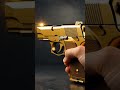 golden handgun luxury