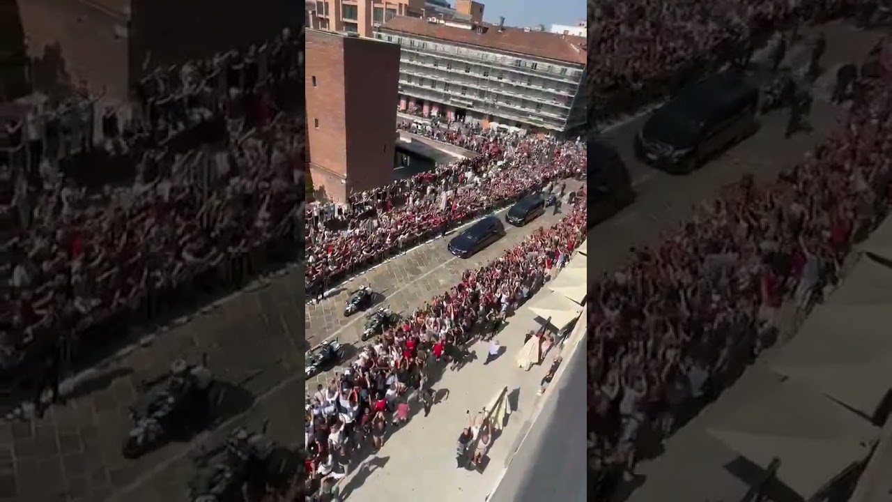 Thousands gather on the streets of Milan for Franco Baresi's funeral.