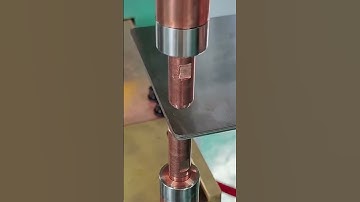 drilling holes in iron using a special tool in several holes