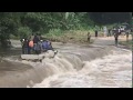 Seing is believing  a toyota land cruiser 79 sc crossing a flooded river in bougainville