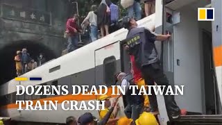 At least 48 feared dead after express train derails in Taiwan