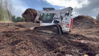 clearing sawdust on the church lot