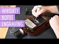 Calligraphy engraving on whiskey bottle | Process video of glass engraving by hand