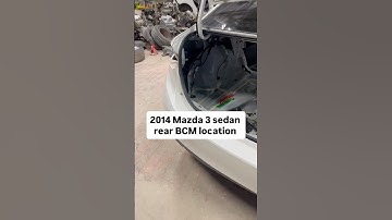 2014 Mazda 3 sedan rear body control module computer BCM part number KD45675Y0G location on car