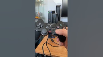 Wat doet de analoge knop op de PS2-controller?