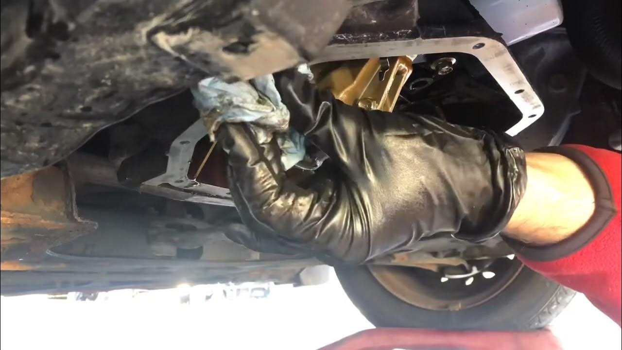 2011 Nissan oil pan replacement - YouTube