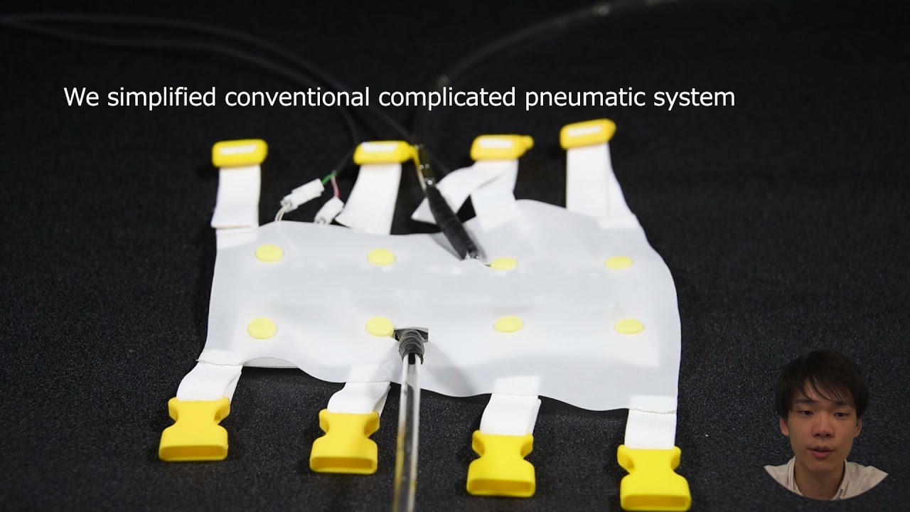 ThermoCaress: A Wearable Haptic Device with Illusory Moving Thermal Stimulation