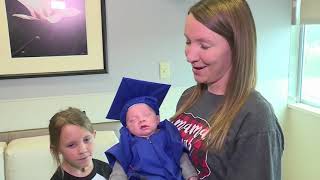 Baby graduates from NICU after 40 days