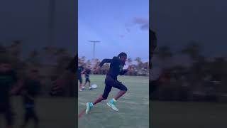 Kodak Black playing football quarterback