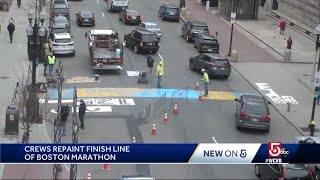Crews repaint Boston Marathon finish line