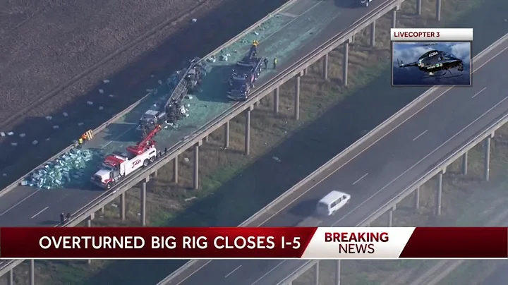 Traffic delays on I-5 after big rig overturns at Yolo Bypass