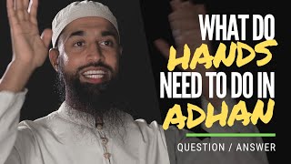 What do you do with your hands in Adhan?