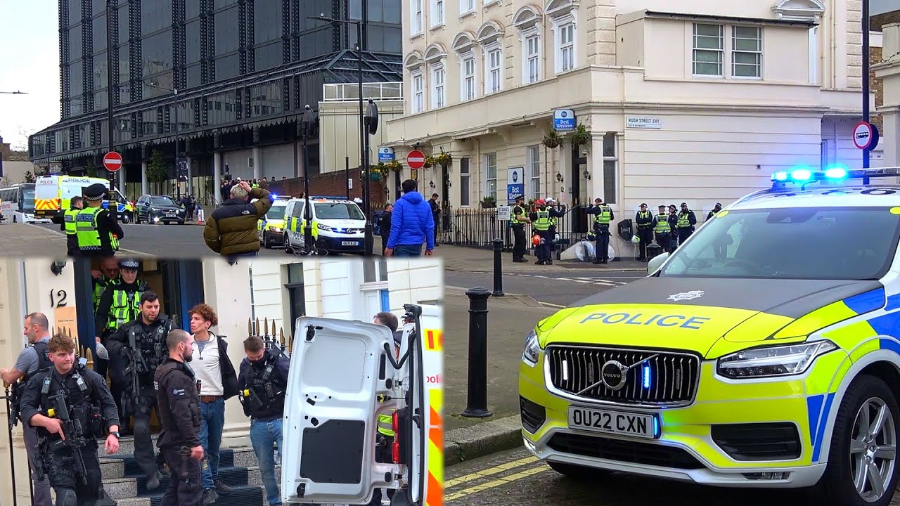 Armed police search and arrest a man near busy London railway station