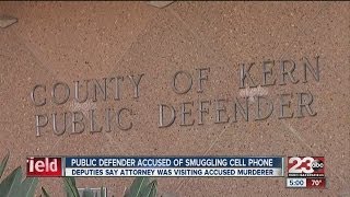 Public defender accused of smuggling cell phone