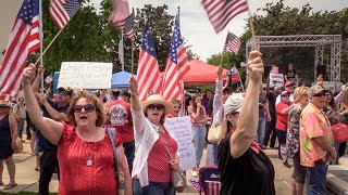 About 300 people protested outside fresno city hall calling for an end
to shelter in place and opening businesses around the despite state's
continu...