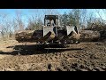 Clearing land with excavator and skidsteer