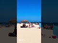 Bikini beauties practicing cricket on the beach!