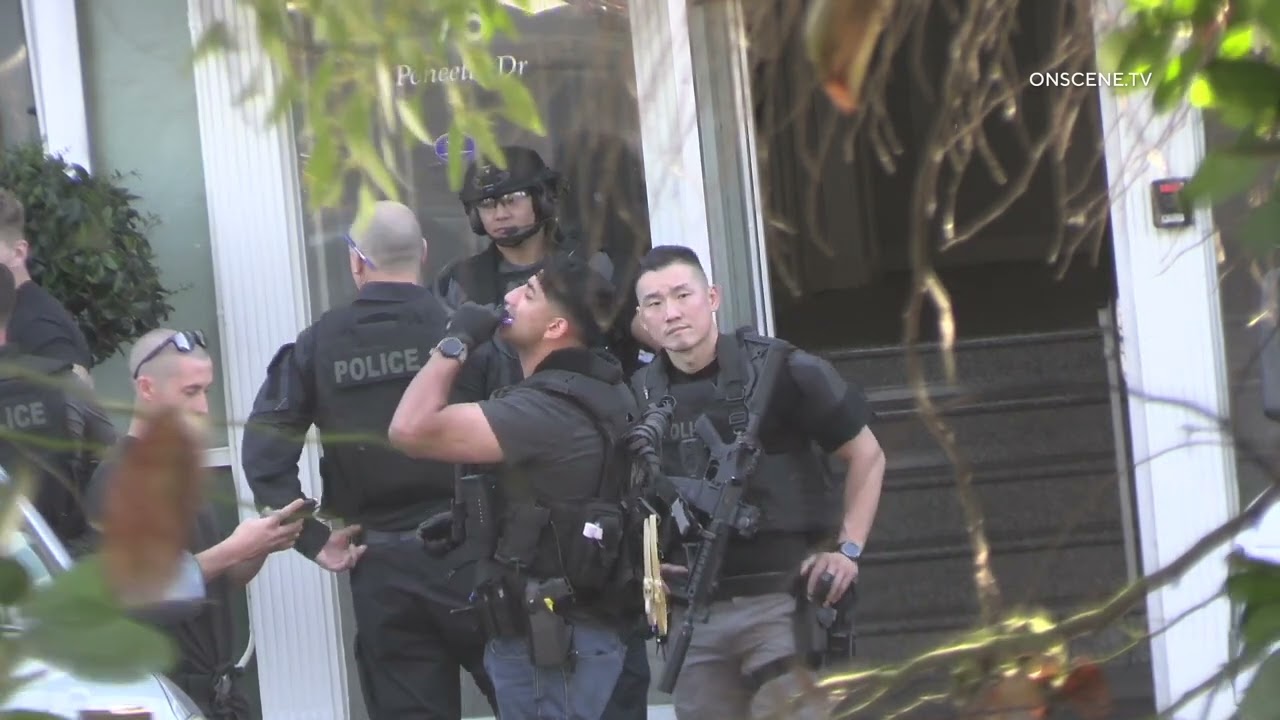 SWAT Raid For Murder Suspect