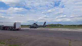 Starspeed Heli EC155 (G-LCPX). Approach, land, taxi,refuelling, taxi take off, departure at EGBO
