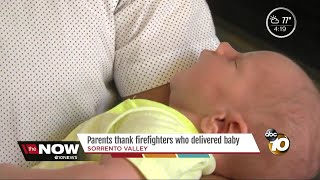 Parents thank firefighters who delivered baby