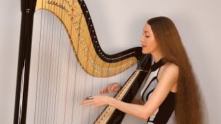 Sarah Chase Playing Harp Glissandos