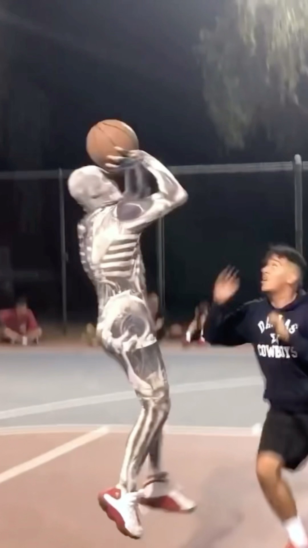 Skeleton Pulls Up To The Basketball Court
