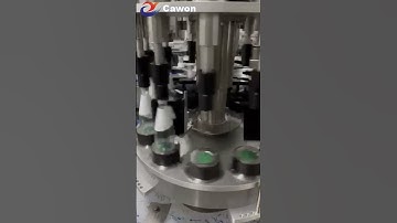 Rotary labeling machine for conical taper glass bottles
