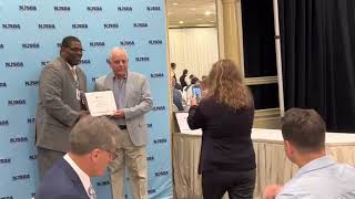 Richard Receives His Award