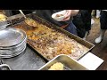 【京橋・まつい】どて焼きの海。串カツ職人の手捌き。 Cooking scene of skilled Kushikatsu chef. Japanese old standing bar.