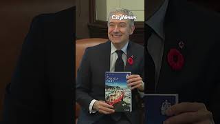Conservative MP crosses aisle to join Liberals, triggering change to budget vote