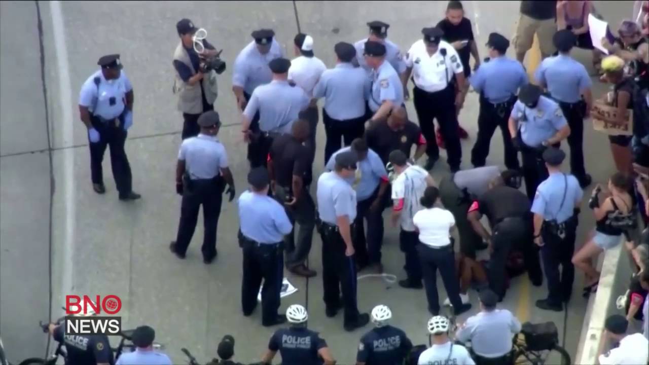 Hundreds march in Philadelphia to protest fatal Alton Sterling police shooting