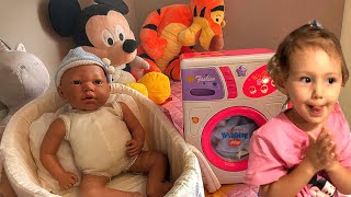 Lots of fun Washing Baby Clothes / Zoe Stories