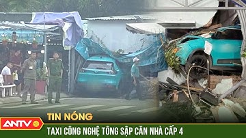 Taxi công nghệ bất ngờ lao lên vỉa hè tông sập nhà dân ở Tp.HCM | ANTV