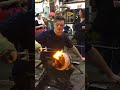 Glass artist Jaan Andres and the Terminal City Glass Co-op team create a flaming &quot;Wish Vase&quot;