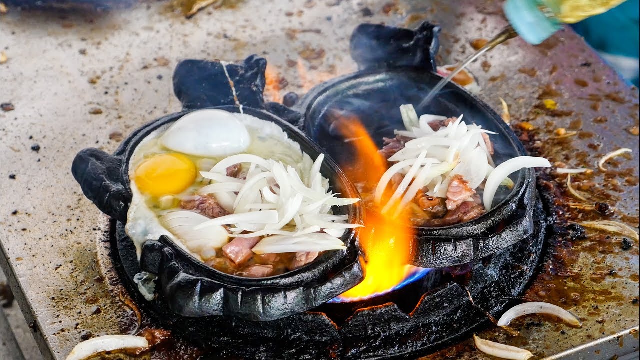 FLAMING BEEF and EGGS! - Must-Eat Cambodian Street Food Dish in Phnom Penh! | Mark Wiens
