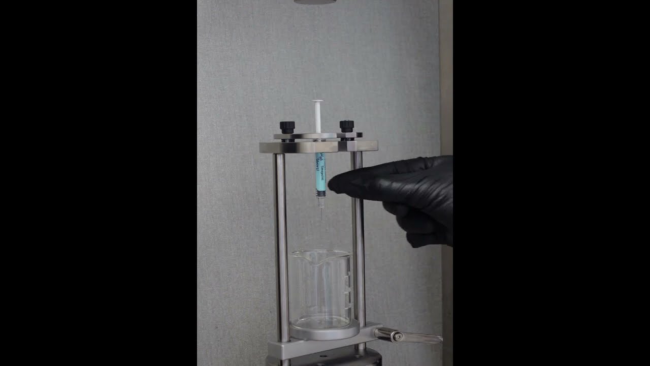 Syringe plunger compression test