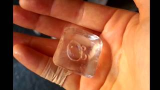 It's a video of an ice cube with a trapped air bubble.