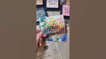 Distress Ink backgrounds for some altered index cards with collage fodder.