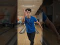 lane and throw the ball overhand, crashing it through a wall mural above the pins. The scene cuts