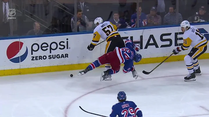 Anthony Angello lays a big hit on Tyler Motte