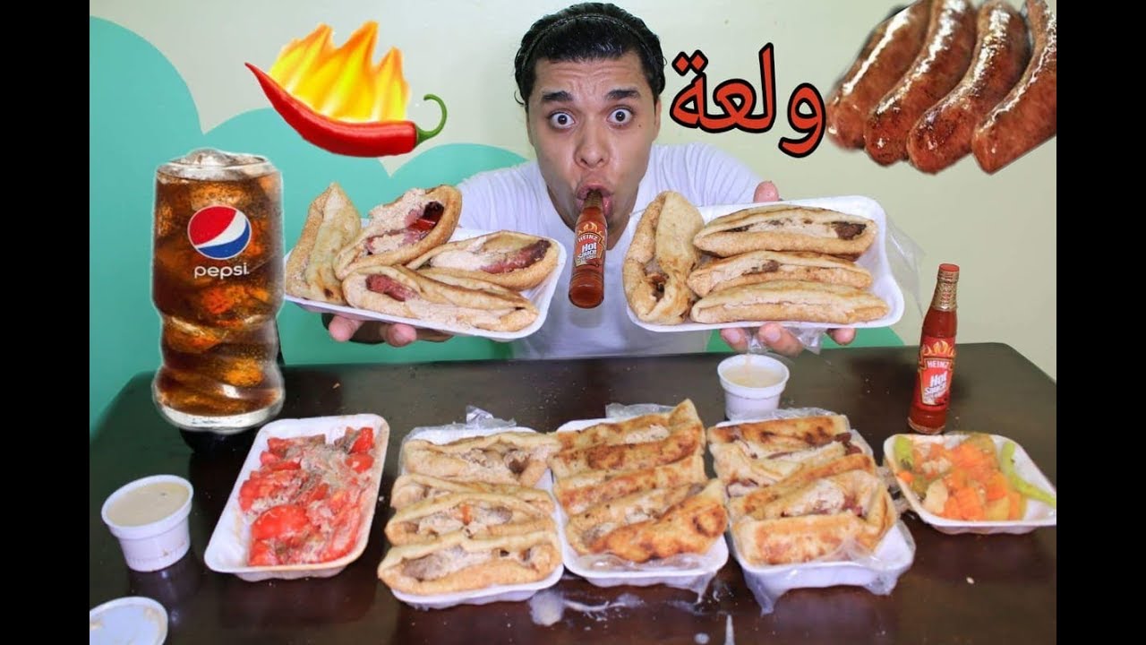 تحدي اكل 20 سندوتش كباب حلة و سجق بلدي بالشطة الناريه ودعم قنوات الصغيرا مع العقاب