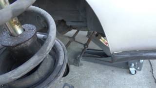 How to Replace Rear Struts 1995 Toyota Corolla
