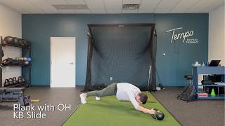 Plank with OH KB Slide