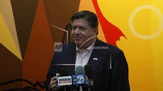 Illinois governor supports community leaders as Chicago prepares for influx of federal officers
